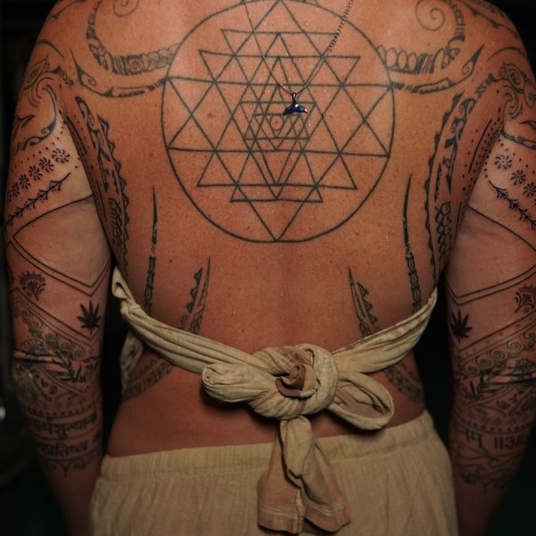 Geometric sacred geometry back piece with ornamental sleeves, custom tattoo Sunshine Coast